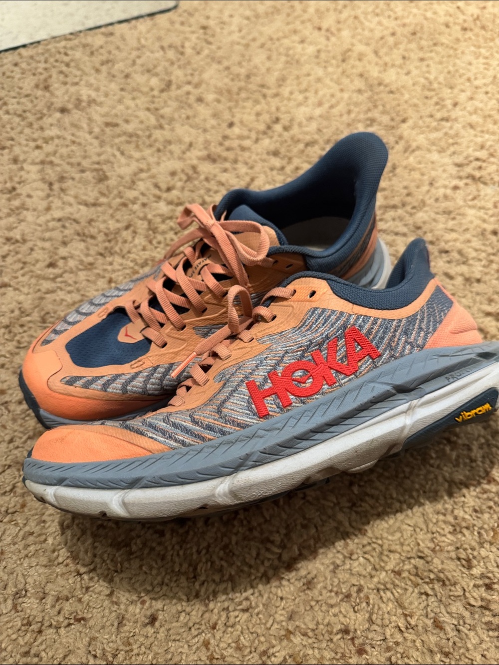 Hoka Woman’s Coral / pink like peach and Navy Athletic Running Shoes